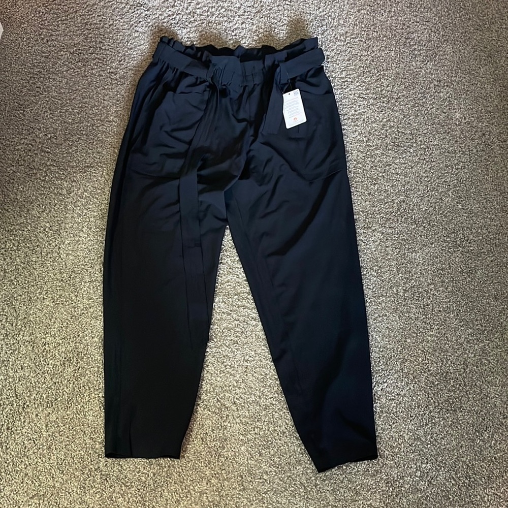 Paper bag slacks. Brand new with tags. Size L.